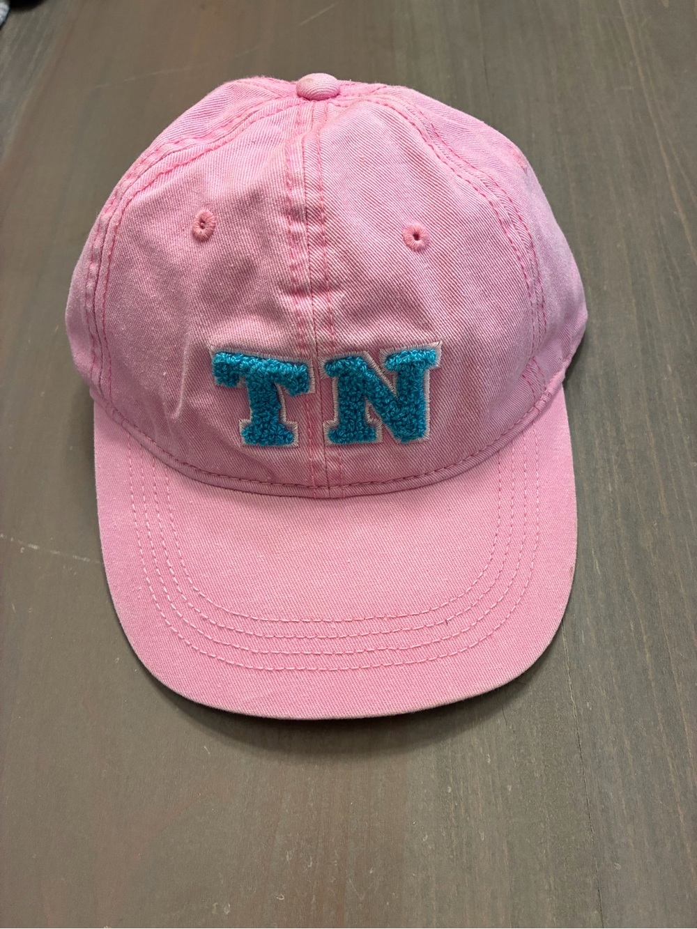 Women’s Pink TN hat.
